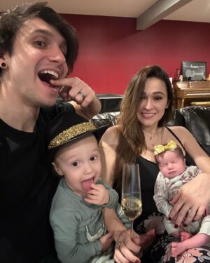 Jaclyn Glenn Instagram - 2023 was good to us ✨🥂✨ Happy new year from 2 tired parents and 2 adorable littles 💛