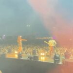Jain Instagram - Dernière de l’été en Corse, c’était fou cette tournée des festivals…J’ai pas les mots…Je rêve de vous présenter ce concert en salle 🤩🤩🤩, j’ai déjà trop hâte. Bravo et merci à ces musicien(ne)s de folie que j’aime profondément, @emelinefougeray @louxormusic @osoumali @benjaminporraz . Bravo et merci à toute mon équipe incroyable, sans qui rien ne serait possible… Julie,Enzo, Derya, JP, Marianne, Jeremy, Mathieu, Johan, Yvess, Crabby, Juliette, Léo, Sergio, Winnie,Yoann, Nico, Guy. Le retour sur scène est un rêve grâce à vous. Ça part 🚀. Ps: On pouvait pas mieux clôturer ce festival qu’en improvisant Makeba à côté du bar U Scalu d’Erbalunga ! (merci au groupe qui nous a prêté la scène). Photo par @loriotcamille