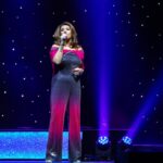 Jane McDonald Instagram – I loved this disco inspired jumpsuit! I bought in New York, it had a tequila sunrise vibe – and you know how I love a cocktail! I added a cape to cover my arms (which I’m conscious of). I absolutely loved performing in it!! 
(Photos from my 2019 Christmas show at @firstdirectarena in #leeds )