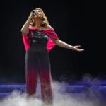 Jane McDonald Instagram - I loved this disco inspired jumpsuit! I bought in New York, it had a tequila sunrise vibe - and you know how I love a cocktail! I added a cape to cover my arms (which I’m conscious of). I absolutely loved performing in it!! (Photos from my 2019 Christmas show at @firstdirectarena in #leeds )