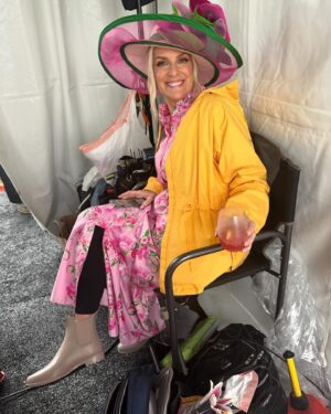 Janice Dean Instagram - This might be one of my favorite behind the scenes pictures ever. Booties, leggings, a yellow rain jacket with a drink in hand. A most successful day. 🤣 (fabulous hat courtesy of @camhatsnyc and picture from @sammmm1015)