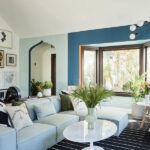 Janina Gavankar Instagram - This is Ms. @mandychengdesign . I’m so proud of what she did to my house. This is the living room, outfitted with @roveconcepts furniture, and a piece @livioramondelli drew, specifically for the wall/tv. The whole redesign can be found on @dwellmagazine . Feel free to AMA and I’ll answer! 📸 @madelinetolle