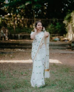 Janvi Byju Instagram - 🌺

Click: @thawfeeq__ 
Outfit: @fara_designs 

#happyonam #onamshoot #traditional #hillpalace #saree #onam2k23