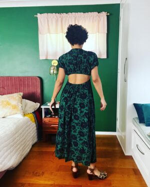 Jasika Nicole Instagram - This has been in heavy rotation this summer, which was an unexpected surprise. I thought it might be too dressed up to wear casually but I was wrong- it’s surprisingly comfortable and feels like a regular sundress, although it’s clearly anything but. I was inspired to make this after I saw @whatkatiewears and @ravelout ‘s versions. The pattern is the #oonadress by @vikisews, a Russian pattern company. The instructions were surprisingly great as I’ve found that a lot of translated instructions can be a bit sparse or lacking. But these came with good pics, detailed instructions and was easy to follow, which was important considering the unique construction. It came together pretty quickly by using facings to create tunnels for all the elastic and the drawstring. My only suggestion would be to keep as many of your elastic casings open on one end as possible til most of the dress is constructed, then try it on to make sure the elastic lengths are comfortable for you; I had to shorten my neck elastic by several inches in order for it to feel secure. Others who made this dress ended up having to stitch the center up a couple of inches so they wouldn’t feel too exposed which is a great fix, but my B cups are able to feel totally fine in such a low cut. Someone once told me they were “blessed by the booby gods” cause they were so well endowed, and it really changed my perspective on my own relationship with my body because I also think I was blessed by the booby gods, but for the opposite reason 😂despite what uber self conscious high school Jasika thought was desirable in the 90’s, it turns out that I adore my small boobs! They are so easy to manage! I could run for an hour without a bra and not hurt! I can go braless in a t shirt and no one will even notice. I can wear inexpensive bras and still feel supported! Moral of the story is, a true blessing is one that brings you peace, whatever that may look like. Sincerely,
Card Carrying Member of the Itty Bitty Titty Commitee 
Beautiful fabric is a green and dark blue rayon(?)) from @blackbirdfabrics ❤️