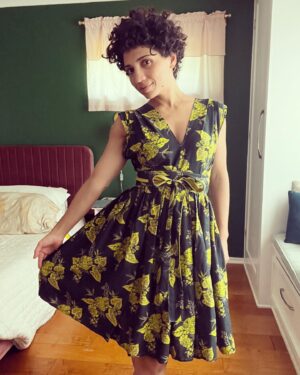 Jasika Nicole Instagram - I am pretty sure that this dress has gotten more compliments from strangers in one afternoon of wear than anything else I have ever made! I’m so surprised! Not that it isn’t beautiful, it’s just an unexpected make from my norm. The bold, pretty fabric is from @wearethefabricstore (gifted as an ambassador) which I chose because of the stunning chartreuse and dark green color combo, but I was stumped as to what to make with it. Then I remembered this cool tik tok video I’d seen a while back where a sewist named @g00dbad_ a low-to-zero waste dress out of a bedsheet and she very generously shared the template so that others could recreate it. It’s not a pattern exactly, but based on just a couple of your own measurements, it’s easily translated into a great wrap dress (very similar to vintage walk away dress patterns) that is very size/gender/age inclusive. I didn’t have a bed sheet to work with but I did have this fabric which I was still able to finagle the dress out of with a little problem solving. The result is so dynamic, with a vintage fit and flare silhouette paired with an impactful print. I didn’t change much to the basic instructions Cara gave but I did add interfacings and facings to my waistband, a buttonhole to one side of my dress opening for the belt to slide through, and I faced my belt with a complimentary fabric because I ran out of my main fabric. It adds some cool interest to the tie, which I love! This dress is easy to wear, doesn’t blow open and expose my bits on a windy day, and makes me feel so pretty! Check out _cccara on tik tok to watch her video if you want to make one for yourself! PS- yes my hair is shorter, no I didn’t want it this short and yes I hate it 🥴