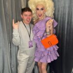 Jasmine Kennedie Instagram – Rupaul says she doesn’t want to see anymore f*^king @hm ….. so I wore it anyway 😂 ! Such an amazing time at @rupaulsdragconuk this year!! Also a huge shout out/thank you  to @lewjizzlefoshizzle for helping me with my booth as well as gifting me this @marcjacobs bag!!! Such an amazing dragcon weekend!! Til next time 🇬🇧 

Hair: @theonlymadd 
Outfit: @hm metaverse collection 
Bag: @marcjacobs 
Ft: @teletubbieshq 

#dragcon #dragconuk #showgirl #frilly #h&m #trans #transwoman #jasminekennedie #rupaul #rpdr #rpdr14 #purple #wigs