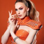 Jasmine Kennedie Instagram - ☢️ Tangerine Dream ☢️ Fit by: @rubenisazadesigner Photo/Polaroids: @ericrichardmagnussen Hair: @full.fantasy_wigs #jasminekennedie #rpdr #rupaul #dragrace #superhero #chooseyourfighter #trans #transwoman #rpdr14 #polaroids #tangerine