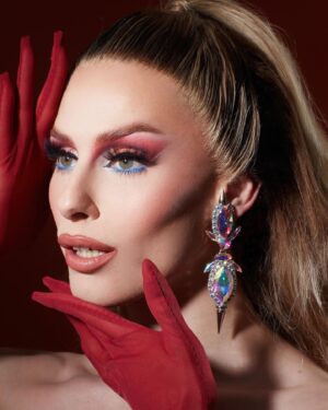 Jasmine Kennedie Instagram - 💋 Take a picture, it’ll last longer 💋

Photos: @ericrichardmagnussen 
Gloves: @xxtastiexx 
Hair: @full.fantasy_wigs 
Earrings: @rubyhymen 

#portait #jasminekennedie #showgirl #trans #transwoman #rpdr #rupaul #dragrace #photography #rpdr14 #lipsyncassasin #beauty #makeup #blonde