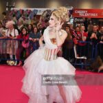 Jasmine Kennedie Instagram - 👑 @rupaulsdragcon UK Day 1 👑 Gown by: @rochart_design Hair: @wigchapel Bag: @versace #jasminekennedie #dragconuk #trans #transwoman #goddess #ethereal #golden #gown #beauty