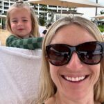 Jasmine Roth Instagram - Day 1 in paradise! ☀️☀️ What’s your favorite way to relax and recharge? The first day of vacation for me is usually about sitting my butt in a chair and moving the least amount possible. Ha! And catching up on emails, texts, and making sure I’m all set to truly “unplug” for the rest of vacation. 🙅🏼‍♀️👩🏼‍💻 I know the option to step away with my family like this is such a privilege and because of that I don’t take a moment of our time together for granted. I also know it’s just a matter of time until @hazelrothofficial wants to hang with friends, wear non-matching clothes, and do her own thing. And that’s ok too. But for right now, I’m cherishing every mom moment with my sweet girl. (And I’m sure @brettrothofficial would also like to hang with friends, wear non-matching clothes, and do his own thing but…NO WAY! He’s stuck with me. 😂) #BuildYourHappy #MyWholeHeart #RothFamilyStory