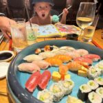 Jasmine Roth Instagram - If I decide to not come home, does anyone want my job? 😉😉 (Also, I didn’t get to have any of that sushi. 🥲🤰🏼) #BuildYourHappy #RothFamilyStory #OutOfOffice