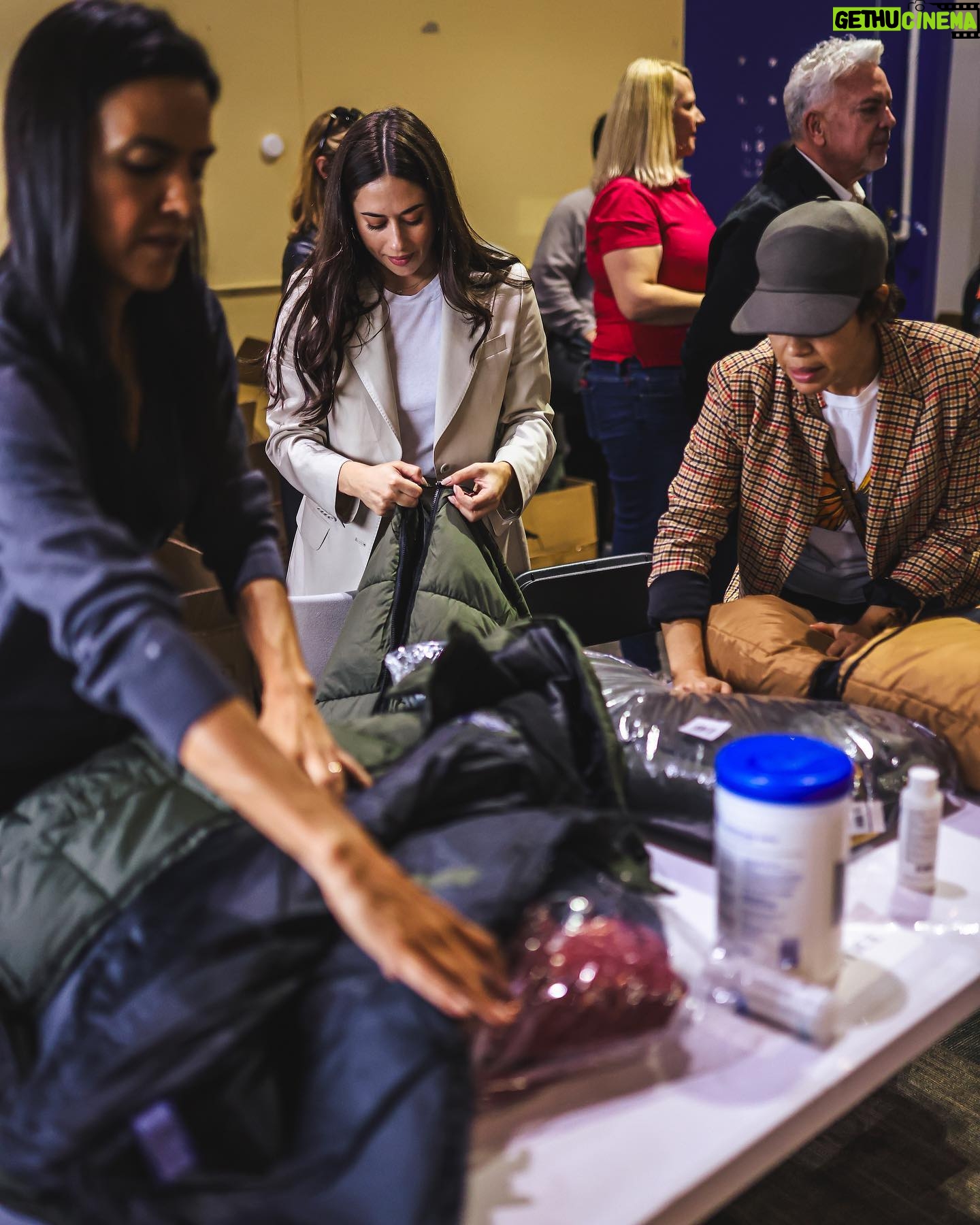 Jeanine Mason Instagram - During our visit, we were able to witness firsthand the services the city provides to these families and distributed 700 winter coats to every resident at the shelter for the upcoming weather. A wildly full circle moment for me! When my family immigrated to this country from Cuba, they were given coats through a federal program at the Freedom Tower in Miami before journeying to Connecticut for their first winter. I spent the morning talking to my mom about how she still remembers that moment and generosity. Thank you to @thisisabouthumanity for bringing community together in service of others and to the @nycemergencymanagement @zachiscol for coordinating the visit. These public servants are doing everything they can but the system is overrun and we need to take more steps to welcome people with dignity, to build more safe and humane immigration pathways, and to provide much more aid to cities like New York and others so they’re not left to burden this on their own. We all have a role to play, and that is why I encourage people to advocate for these policy changes and to follow @thisisabouthumanity, @immdef_lawcenter, and @fwdus to stay up-to-date on immigration policies and to learn about volunteer opportunities as they become available. #WelcomeWithDignity #ThisisAboutHumanity (Photos by @ericapress.jpg)