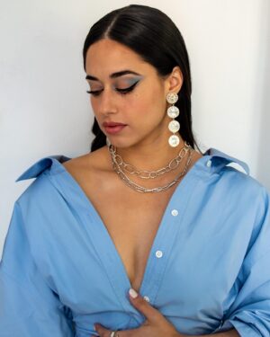 Jeanine Mason Instagram - This TV scientist and her aliens are nearly back. @cwroswellnm 👽 

Also, #soscuba. Please help amplify the voices of Cubans on the island fighting for their lives and country. #vivacubalibre 

Stylist: @the_jorgemorales 
Makeup: @carolinadali (Genius with the dusty blue eye!)
Hair: @jessibutterfield 
Dress   shoes : @alexanderwangny 
Earrings: @alebremerjewelry
Necklaces: @anotherfeather & @shopmachete
Bracelet: @rebeccapintojewelry
Rings:  Reggie Studio & @youngfrankk