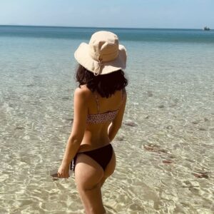 Jeannie Elise Mai Instagram - 📍Starfish beach 🇻🇳🏝️🌞🍹 ps if u look closely under my left cheek, u will spot my newest tattoo 😜 can anyone guess what it says lmao