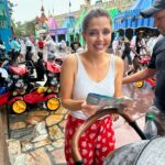 Jen Lilley Instagram - Here’s a random photo from the other day at Disney world when it torrential rained and I forgot our ponchos so I just told the kids to embrace it and have fun jumping in puddles. My sweet nanny and friend Ashley took this because she could not stop laughing at the water just dripping off my nose and eye lashes as I still attempted to read a our soggier by the second map. She also said it looks like I was wearing a shower cap. I don’t see it but she was laughing so hard at that she was wheezing, so if you see it, I hope it makes you laugh that hard too. My only prayer was my bra was thick enough to not make this kid friendly park extremely indecent in my white tank. 🤣🙈 What are some of the “this is fun” when it’s not the most fun stories you’ve told your kids when life gets real?