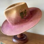 Jenna Elfman Instagram - The universe doing its thing! 🤘🏽👀🤘🏽 This hat, born from a spontaneous experiment, became a canvas for a new idea. Hand-dying the felt added that extra touch of uniquness. I hadn’t played with dye before this, so I was excited to see how it would turn out. While I was literally putting the finishing touches to this hat, I recieved a call from the lovely @therealkateceberano looking for a special gift for her dearest friend of 25 years, @jennaelfman in town for just a brief visit. Timing would be tight to make something that quick, but the universe stepped in when I shared a photo of this hat in progress. Instantly, we knew it was the perfect creation. These abstract hats aren’t for everyone, and that’s the point. They’re crafted for the ones meant to wear them. The universe works in mysterious ways, connecting us with the right person at the right time. Such a joy to meet you, Jenna! Wishing you an incredible time in Australia. And sending heaps of love to you, Kate. 🫵🏼💜 Special mention to @adamsavillebrown for being in the right spot at the right time also. 🤘🏽 #hatmaker #artist #universe #customhat #connection #friends