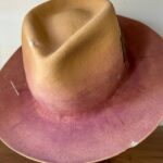Jenna Elfman Instagram - The universe doing its thing! 🤘🏽👀🤘🏽 This hat, born from a spontaneous experiment, became a canvas for a new idea. Hand-dying the felt added that extra touch of uniquness. I hadn’t played with dye before this, so I was excited to see how it would turn out. While I was literally putting the finishing touches to this hat, I recieved a call from the lovely @therealkateceberano looking for a special gift for her dearest friend of 25 years, @jennaelfman in town for just a brief visit. Timing would be tight to make something that quick, but the universe stepped in when I shared a photo of this hat in progress. Instantly, we knew it was the perfect creation. These abstract hats aren’t for everyone, and that’s the point. They’re crafted for the ones meant to wear them. The universe works in mysterious ways, connecting us with the right person at the right time. Such a joy to meet you, Jenna! Wishing you an incredible time in Australia. And sending heaps of love to you, Kate. 🫵🏼💜 Special mention to @adamsavillebrown for being in the right spot at the right time also. 🤘🏽 #hatmaker #artist #universe #customhat #connection #friends