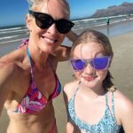 Jenni Falconer Instagram - Turns out it’s a bit blustery on the beach here. What’s it like where you are?! ❤️🇿🇦☀️😍 #capetown #beachlife #familytime