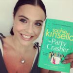 Jennie Jacques Instagram – My 1st @sophiekinsellawriter book 📖 Easy-to-read, page turner #romcom with several unexpected twists & turns & some verrry funny scenarios. The art on the front of the book shows a grown woman hiding under the table… listening in on the guests (her friends & fam) at a dinner party she’s “not” supposed to “not” be at… 😂 Strong 4.5/5 💥 
*
Greenoaks is a quirky old family house with history 🏡 & the youngest sibling, Effie (now an adult) gate crashes the so-called “leaving-do” (hosted by the seemingly stereotypical, gold-digger, step-mum) when the family home is rather unexpectedly SOLD! 
*
When I’m well enough to get back to acting again, I would happily play any of the women in this. All so different, but each certainly had “something” about their character. 
It’s light hearted, arguably “eccentric” middle class humour, not with out depth; broken families, divorce & the human insecurities we can all relate to in one way or another – a sprinkle of misjudging people 🙈 makes everyone all the more real.
Each of the 3 siblings who grew up at Greenoaks – Bean, Effie & Gus – have their own life sh*t going on (behind the scenes) & Kinsella reveals the flaws, worries & secrets, purposefully timed to keep the reader (& her characters) on their toes. The fact that Effie has supposedly only “gate crashed” the party to find her childhood Russian Dolls, is a potent metaphor, which is dripped into the narrative throughout, as we discover the layers to each colourful character.
*
I often tend to give a bit more away in my #bookreviews but I’m not going to because I think it could spoil the structure. If you want a straightforward bulletproof romantic comedy to read this summer, grab it! 
*
A moment, towards the end, where it felt a little lulling re the storyline… if I’m totally honest… caught myself starting to speed read… BUT the way in which Kinsella wrapped it all up, threw me off guard (in a good way!) I was pulled back in & very much look forward to reading more!