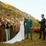 Jennifer Holland Instagram – James! Thank you for sharing your love, life and family with me. Thank you for choosing me, for elevating me, and for always making me belly laugh. Here’s to many more years to follow the first extraordinary 7. 
………………………………………..
@jamesgunn and I got married surrounded by the most beautiful humans, the most magical scenery, and endless love and laughter. My gratitude is bursting at the seams. Thank you to every single staff member who worked so hard to make this event special for us and for our guests. It was so seamless and stunningly beautiful, I felt like I was in a movie. We only had one uninvited guest: Mr. Bull Moose. But, he sort of lives there. So, I guess we were in his home.
My Hair: @lisasatornhair 
My MU: @rachelgoodwinmakeup 
James grooming: @louisemooninc 
Stylist: @carrielauren 
@lexfordays @victordevita 
Photos 1,2,3,4,6,7,9: @jonnymarlow 
Photos 5, 8: @jessmigliophoto
Event coordinator: @eksevents