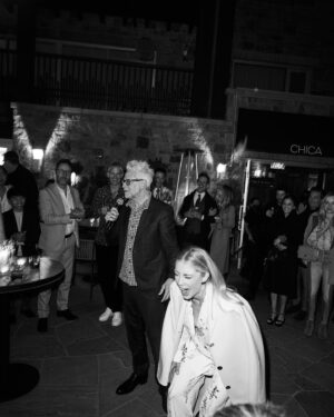 Jennifer Holland Instagram - Fun Fact: James gave a speech at our wedding Welcome Party where he said “I don’t know where my fiancé has run off to, but we both want to thank you from the bottom of our hearts…” thing is- I was standing right where I am in these photos. @jonnymarlow caught the exact moment that the whole party was laughing and James was confused. Everyone thought it was a comedy ‘bit’ we had planned. It was not a bit. James just truly didn’t see his wife standing directly next to him. And it was hilarious. 
When I think about what makes my life colorful, what makes my house feel like a home, what makes me excited about new experiences and what makes me excited about experiencing life’s wonders… it’s you. My better half. My best friend. My dog’s cuddle buddy and my other dog’s chew toy. Without you, life doesn’t make sense. 
Happy birthday, @jamesgunn 🎂 🫶🏻