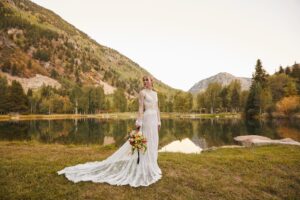 Jennifer Holland Instagram - James! Thank you for sharing your love, life and family with me. Thank you for choosing me, for elevating me, and for always making me belly laugh. Here’s to many more years to follow the first extraordinary 7. 
………………………………………..
@jamesgunn and I got married surrounded by the most beautiful humans, the most magical scenery, and endless love and laughter. My gratitude is bursting at the seams. Thank you to every single staff member who worked so hard to make this event special for us and for our guests. It was so seamless and stunningly beautiful, I felt like I was in a movie. We only had one uninvited guest: Mr. Bull Moose. But, he sort of lives there. So, I guess we were in his home.
My Hair: @lisasatornhair 
My MU: @rachelgoodwinmakeup 
James grooming: @louisemooninc 
Stylist: @carrielauren 
@lexfordays @victordevita 
Photos 1,2,3,4,6,7,9: @jonnymarlow 
Photos 5, 8: @jessmigliophoto
Event coordinator: @eksevents