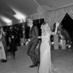 Jennifer Holland Instagram - A YEAR?!? STFU. It feels at once like we’ve spent a whole life time and just a moment in this new chapter of our life as husband and wife. If there is one overarching theme that has washed over me in this past year of great change, it is that our marriage is rich with and supported by the most caring group of friends and family. We are so fortunate, me and you. ❤️ May we continue to deepen our love, empathy, friendship, and laughter, as we have this past year, for many years to come. I am overwhelmed with happiness looking back on this year of memories with you. Happy Anniversary, Husband! @jamesgunn 🫶🏻