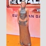 Jennifer Holland Instagram - Not only did I get to visit Paris for the first time ever with #gotg press tour, but I also got to go to @disneylandparis for a fancy Gala dressed in this 90s inspired two-piece 💧 liquid 💧 dream ensemble. The. Fans. Were. Everything. 🫶🏻 Dress: @cucculellishaheen Stylist: @jordanshilee HMU: @anissarenko
