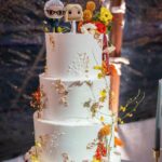 Jennifer Holland Instagram - After over 7 years together, I finally married the love of my life, @jenniferlholland. What an incredible, beautiful, stunning day surrounded by the most wonderful family and friends in the world. And, yes, that’s a moose that showed up as the ceremony began! And also, yes, @originalfunko made our wedding cake toppers designed on our actual tux and gown (Jenn wouldn’t let me see them before the wedding because her dress was too perfectly done!) And, yes, we had Sunday fun festivities including a Marvel vs DC softball game (@michael_rooker played on both teams!) Thanks to @eksevents for planning everything! Photos 1, 3, 5, 7, 8, 9 & 10 by @jonnymarlow Photos 4 & 6 by @jessmigliophoto Stylings by @carrielauren @lexfordays @victordevita Jenn’s Hair by @lisasatornhair Jenn’s Makeup by @rachelgoodwinmakeup My grooming by @louisemooninc