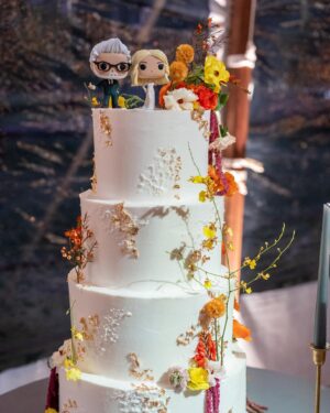 Jennifer Holland Instagram - After over 7 years together, I finally married the love of my life, @jenniferlholland. What an incredible, beautiful, stunning day surrounded by the most wonderful family and friends in the world. And, yes, that’s a moose that showed up as the ceremony began! And also, yes, @originalfunko made our wedding cake toppers designed on our actual tux and gown (Jenn wouldn’t let me see them before the wedding because her dress was too perfectly done!) And, yes, we had Sunday fun festivities including a Marvel vs DC softball game (@michael_rooker played on both teams!)
 
Thanks to @eksevents for planning everything!
Photos 1, 3, 5, 7, 8, 9 & 10 by @jonnymarlow 
Photos 4 & 6 by @jessmigliophoto 
Stylings by @carrielauren @lexfordays @victordevita
Jenn’s Hair by @lisasatornhair
Jenn’s Makeup by @rachelgoodwinmakeup
My grooming by @louisemooninc