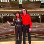 Jenny Lewis Instagram – the daffodils ride! 
what a splendid run through texas, atl,  the midwest & ending at the mother church herself @theryman 
thank you to @thewatsontwins for the mini rabbit fur coat 18 year anniversary reunion 
thank you to my sons @amarillohighway & @loganledger for joining us. 
📸 by @thesadpunk_  for @floodmagazine & @vanessaredd_n
glam by @lib_george & @bheadabe