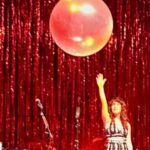 Jenny Lewis Instagram - i’m not a stats gal nor am i a betting person but this feels friggin awesome ! i’ve never been #1 at anything except for rolling whale shaped doobies… when i was 10 my soccer team the garfields ( which i named ) was poised to win the AYSO playoffs @ balboa park but due to the rain & mud we came in 4th that’s when i decided that competition was not for me and now when i play ping pong i prefer to rally for peace and love a la @ringostarrmusic slide 5 is what i look like when i’m writing a song and i worked on Psychos for a couple years! thank you to my wonderful band and crew for these roses and the congrats! it means the world coming from my team we out here playing JOYBALL with coach @ryanmadora laying out washcloth bases in the grass. last night in boston a balloon floated overhead while we sang acid tongue we think peg leg johnny the notorious gangster ghost from chicago hitched a ride on our tour bus making haunted art with your friends is like a dreams come true girl or a DILFY jagger with his kiddo thank you @davecobb7 @natesmithdrums, greg koller, brian allen, greg leisz & @jrwolfey oh, and today would’ve been jerry’s 85th bday! love you and miss you jerry
