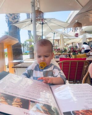 Jessica Fox Instagram - Palma. Palma. Palma. 

1. Bucket and Sand and rocking his @littlegreenradicals swimsuit. 
2. Perusing the menu. 
3. Mirror selfie.
4. Daddies cuddles. 
5. Poor bar fun in more @littlegreenradicals 
6. Keeping it cool in @sunniesforkids and @mumandme_app 
7. Matchy, Matchy. 
8. Long day. 
9. Mini Mohawk.
10. When you think you order baby friendly and it arrives raw and on fire. 

*items mentioned PR