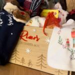 Jessica Fox Instagram - Packing River’s first ever December box. Incase you hadn’t noticed, I’m very excited. River is a bit nonplussed but likes all the lights! December Box - @chester_and_ro Blanket and Vest - @my1styears Plate and coverall bib - @etsyuk Onesie and soft bib - @georgiebellesboutique Socks - @sainsburys Cuddly - @jellycat Flag - @arnoldandthecaterpillar Pyjamas - @wexbaby Reindeer Food - @lornacunningham94 Books - Various.