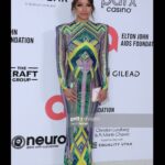 Jessica Parker Kennedy Instagram - Oscar weekend! Thank you for having me @EltonJohn and @EJAF ❤️ Styling by @LisaCStyles Custom Dress by @MichaelCostello Bag by @TylerEllisOfficial Jewels by @RavenFineJewelers and @DangeloJoyeria Makeup by @Grace_Phillips Hair by @GuiniusHair