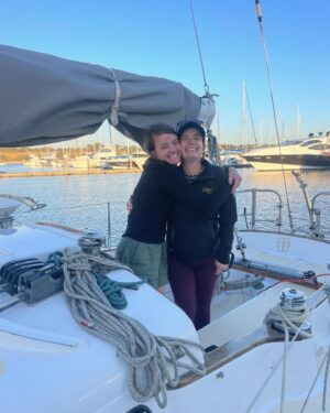Jessica Watson Instagram - A very different Easter. 

🛠️ ➡️⛵️

📷:
1. Final twilight sail for the season 
2. & 3. Spot the Queenslander🧣😂🤰💙
4. This time last year - brutal sanding boot camp (thanks sis!)
