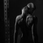Jessie Graff Instagram - This is one of my favorite pictures of from a shoot I did years ago with @jessiegraffpwr that somehow never got posted. One of the coolest things for me about the shoot was that she was coming off of a pretty significant injury and hadn’t been able to work out the way she wanted to, but still looked beyond strong as she always does. This was actually a quiet moment of reflection before she started doing pull-ups (swipe for that shot), which were the first ones she had done in months. Jessie is one of the nicest and most motivated people I’ve ever met, I wish I had half of her internal drive/motivation!! … #fitness #fitnessmotivation #serenity #blackandwhitephotography #studiolighting #strength #pullups #americanninjawarrior #jessiegraff #stuntwoman
