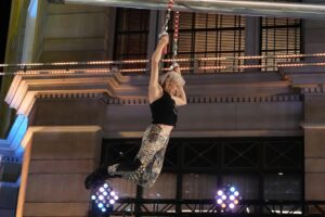 Jessie Graff Instagram - So grateful to be back competing on @ninjawarrior ! And this time, with my mom @ginnymaccoll !!! 
If you haven’t seen last week’s episode yet, spoiler alerts! Go catch up now!
Win: this was the first time I’ve made it to the 5th obstacle without feeling even a little pumped!  My grip was so fresh and ready!
Room for growth: I had a unique strategy that no one else had tried, which had the potential to save me time and energy.  Rather than hold a left hand lockoff, while trying to turn the cube with the thin ledges on the front side, i planned to swing forward and grab any one of the three large jugs on the right side of the cube.  My big mistake was not choosing which one to reach for and aiming precisely.  I swatted between two jugs and missed both.  If i had thought about how (nearly) impossible it would be for me to hold on to a slippery plastic flat ledge on a one armed back swing, i might not have chosen to take that risk.  So in hind sight, I do wish I’d taken the more standard path.  But i had so much fun strategizing for this obstacle, and wish i could try it again!  Thank you so much #americanninjawarrior for another opportunity to solve puzzles and test my limits! I definitely grew stronger and smarter through this challenge!