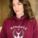 Jewel Staite Instagram - Is it even the holidays if you aren’t wearing your @romance__university swag?
