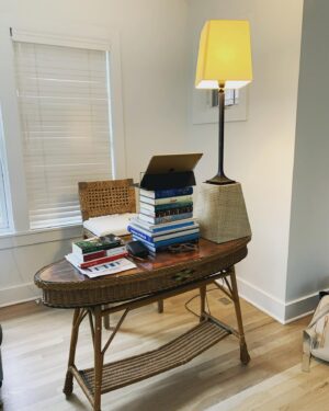 Joanna Coles Instagram - Ok, this home set up for zoom meetings is not really sustainable. Keep knocking over the teetering book tower...All you influencers out there, what’s the best home lighting rig for these relentless virtual meetings? Time to get serious...🙏🙏