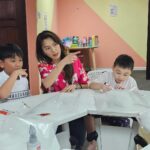Joanne Peh Instagram – As the Year of the Dragon unfolds, it’s clear that challenges abound for many of us. In curating this year’s Chinese New Year workshop at @thedimpleloft, I felt drawn to share the tale of 《鱼跃龙门》— a story that embodies perseverance and determination. Among the myriad interpretations of this folk tale, the version where a red carp, after an initial failed attempt, seeks the aid of a friend to overcome adversity, resonated with me the most. Little did I know, each time I shared this story, a new lesson emerged.
Recently, I had the privilege of taking the children from @glyph.asia on the red carp’s transformative journey. To become a dragon, the red carp must leap over the Dragon’s Gate—a feat seemingly insurmountable due to the swift currents. As I recounted the story in English, answering the children’s eager questions, a new insight struck me: sometimes, to achieve our goals, we must initially steer away from them to discover alternative pathways that bring us closer.
The moment of the red carp’s leap, assisted by the timely push from his friend, the black carp, right before his strength waned, underscored a profound truth. While we’re often advised to keep our goals in sight and remain undeterred, occasionally, stepping back isn’t an act of surrender but an opportunity to explore new avenues and possibilities. That extra push? Its value is immeasurable, but only when the timing is perfect.
As the Chinese New Year celebrations draw to a close, I extend my heartfelt wishes to all who are poised to make their leap this year. May you find the strength, tenacity, intelligence, and fortune needed to achieve your aspirations. 🐉🧧