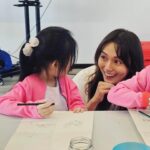 Joanne Peh Instagram - I’m an actress, and after all these years of being immersed in the world of make-believe, I hold a profound belief in the transformative power of storytelling. It’s not merely about tales and fables; it’s a bridge to human emotions. Some days, I miss myself as a child, when I had a boundless imagination and could write the wildest, most whimsical stories in school. That’s why I started @thedimpleloft. My aim is to safeguard the boundless realms of children’s imagination from the confines of traditional curricula, fostering a space where they can weave their own stories, embrace their silliness, and simply be whatever their hearts desire, free from the constraints of formal education. In school, knowledge is often compartmentalized, but my advocacy for lateral thinking led to the inception of the Silk Series bilingual workshops. Silk, with its rich history and multifaceted nature, becomes a gateway to exploring science, art, culture, music, history, and geography. This interdisciplinary approach underscores the interconnectedness of knowledge, the intertwining of stories, and the importance of empathy, creativity in problem-solving, and the humility to learn from diverse perspectives. Through @thedimpleloft, I seek to kindle in children the same wonder and imaginative freedom that once defined my childhood, encouraging them to see beyond the boundaries of conventional learning and embrace the infinite possibilities that creativity and storytelling hold. Join me this weekend for our workshop finale. Don’t worry if you didn’t come last week! You know stories don’t always have to be linear, and art knows no boundaries. 😉 Link in bio. #CreativeKids #EarlyChildhoodEducation #ParentingWithPurpose #TheDimpleLoft #SilkSeriesWorkshops #ArtMeetsStory #InventiveMinds #LateralThinking #BeyondTheClassroom #LearningThroughArt #CreativeProblemSolving #inspireyoungminds