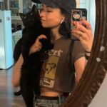 Jodelle Ferland Instagram - just once i would like a photo with my cat where he doesn’t look like an angry soot sprite