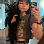 Jodelle Ferland Instagram - just once i would like a photo with my cat where he doesn’t look like an angry soot sprite