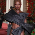 Jodie Turner-Smith Instagram - ✨VOGUE WORLD✨ what an experience!!!!!! to all of the hands that helped put me together: my amazing trainer @davidhigginslondon who is helping me 6x/week to sculpt this work in progress body, the lovely @harry_lambert who styled me, my glorious glam girls @marcialuvlocks & @joeyjoeychoy, @charlottetilbury makeup, & to my love @edward_enninful & the entire #vogue team for including me in this epic night— THANK YOU ❤️‍🔥 anyone who has known me for more than 5 minutes before all of this “celebrity” knows that i’m not new to this pantless trend— i’m true to this!!! i’ve been that girl, she was just pregnant and postpartum for a sec 😹 & while i know many of you have opinions on this look (which you are entitled to my darlings), i’m going to leave you with the only opinion on the matter that i rate— my mother @hildaturnersmith’s: “You are fire you are a beast to be reckoned with you. Look fantastic. You look amazing you look like I don’t even know what else to say. I love you keep on keeping on you are Jodie TurnerSmith that came from my belly love you big up.” 🥹🥹🥹 SWIPE for the bts red carpet pix: @gettyimages