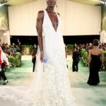 Jodie Turner-Smith Instagram – this met gala was a very special one for me… my first stepping out on my own. i had many thoughts after reading the short story that the theme was based on… but what i took away from it was a desire to represent both the power of nature and the delicacy of it. in nature, death is both an ending *and* a beginning. when you prune away that which is dead, new buds are free to grow. fitting, then, that the dress #DanielLee designed for me, full of english flowers, was deliberately bridal. white, representing a rebirth. a clean start. a recommitment to the most important relationship i will ever have, the relationship from which all others grow: my relationship with myself. it is through loving and honouring myself that i am able to love and honour my daughter, and teach her to do the same. 

i am ever changing, ever growing, always beginning… and FREE, to love better, stronger, more fiercely and fearlessly than i ever have 💞
THANK YOU ENDLESSLY, @burberry, for your support and your creativity and your love. can’t wait to see what’s next…!!!!!