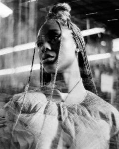 Jodie Turner-Smith Instagram - so proud to call myself a part of the @stoneisland family ✊🏿🖤 we all have a compass inside… listen to it… and follow your own ✨ shot by the talented jezza @jeremyelkin narrated by my obsession @santandave a very special thank you to @robert.triefus for including me, for seeing my spirit and for always supporting me at every moment. and a big shoutout to @roundtablebooks, the best (&BLACK-OWNED!) bookshop in all of london, for opening their doors early and letting me live among their books. had to buy a whole new suitcase to get all the books i bought back to LA! #TheCompassInside #AndYesIDidAccidentallyLeakThisYesterday #SozButNotSoz