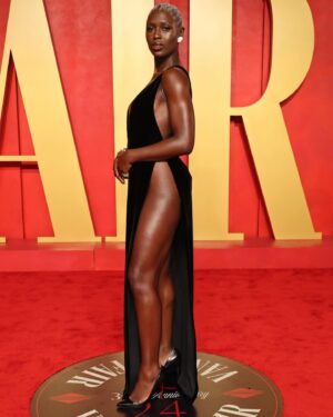 Jodie Turner-Smith Instagram - moisturised . blessed . highly favoured . 
🖤🍫🍯🤎

this gown has made its way to the top of my list as my favourite i have ever worn!!! thank you @sabatods and the entire team over @gucci for making me feel so sexy and so SUPPORTED. i love you guys forever!!!! 

thank you to my love @charlottetilbury for sending  @kelechisart to touch my face and give me the most incredible @charlottetilburyskincare chocolate beat!!!!!!!! 

my angel @marcialuvlocks, the hair was everything and so are you!!! 

& of course, to my boys @waymanandmicah LET’S NEVER STOP ❤️‍🔥❤️‍🔥❤️‍🔥🥹🥹🥹

full of gratitude for this life and for the opportunity to be in rooms like this and have experiences like these. 
in case you couldn’t tell— i am having so much fun!!! 
#HappyToBeHere