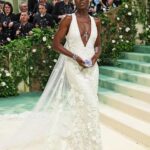 Jodie Turner-Smith Instagram – this met gala was a very special one for me… my first stepping out on my own. i had many thoughts after reading the short story that the theme was based on… but what i took away from it was a desire to represent both the power of nature and the delicacy of it. in nature, death is both an ending *and* a beginning. when you prune away that which is dead, new buds are free to grow. fitting, then, that the dress #DanielLee designed for me, full of english flowers, was deliberately bridal. white, representing a rebirth. a clean start. a recommitment to the most important relationship i will ever have, the relationship from which all others grow: my relationship with myself. it is through loving and honouring myself that i am able to love and honour my daughter, and teach her to do the same. 

i am ever changing, ever growing, always beginning… and FREE, to love better, stronger, more fiercely and fearlessly than i ever have 💞
THANK YOU ENDLESSLY, @burberry, for your support and your creativity and your love. can’t wait to see what’s next…!!!!!