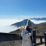 Joey Leong Instagram - It was 0 ℃ at mid mountain our hands and nose were frozen and it was demotivating to think that reaching the top of the mountain meant enduring much lower temperatures if fear stops you there, you wouldn’t know the top was much warmer, bathed in strong sunlight, and that the view was priceless ✧ 🧥🧤🧣👒🎧 from @universaltraveller_my #joeyleonginchengdu #joeyleongtravels